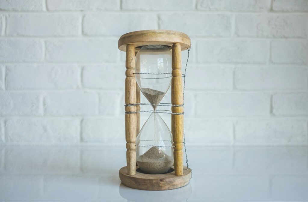 Sand running through an hourglass, a reminder to wait and slow down after a Wayback Machine 429 error