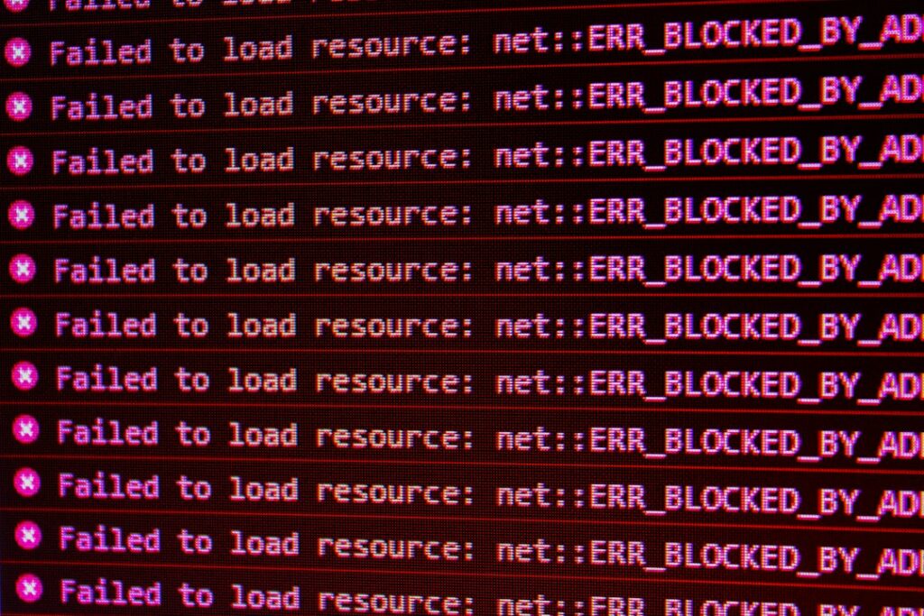 Red error messages on a dark computer screen, as when a Wayback Machine downloader is not working